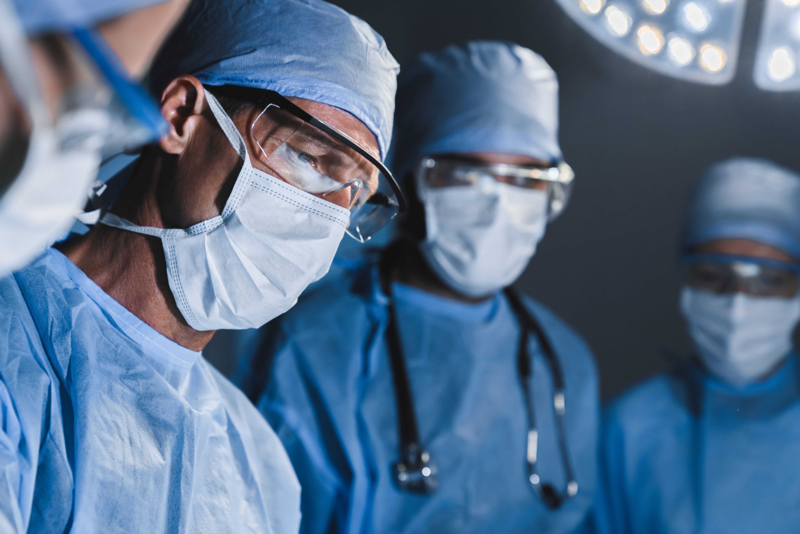 Operating room lights above a surgical table