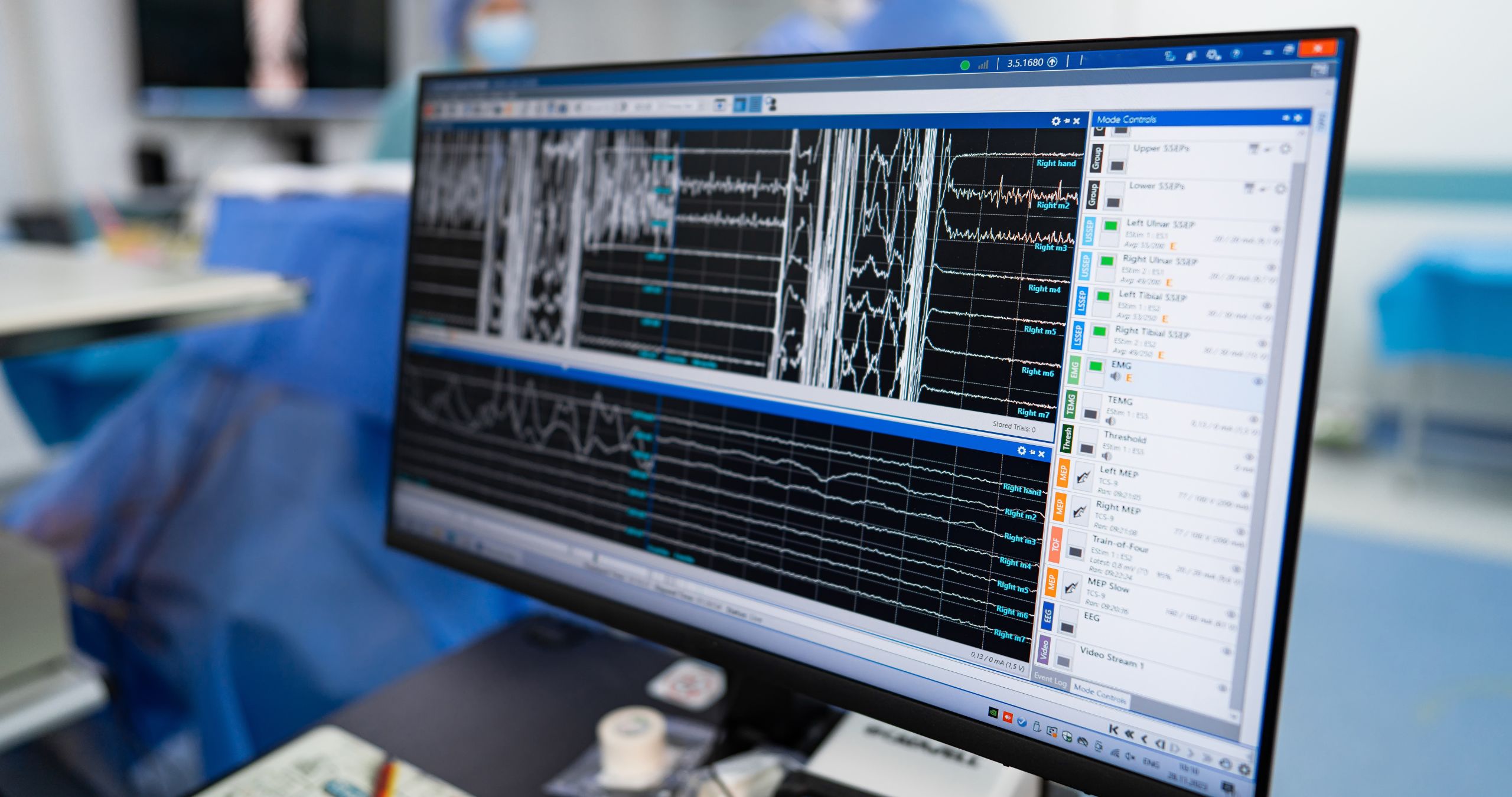 Surgical team monitoring neurophysiological signals during a procedure